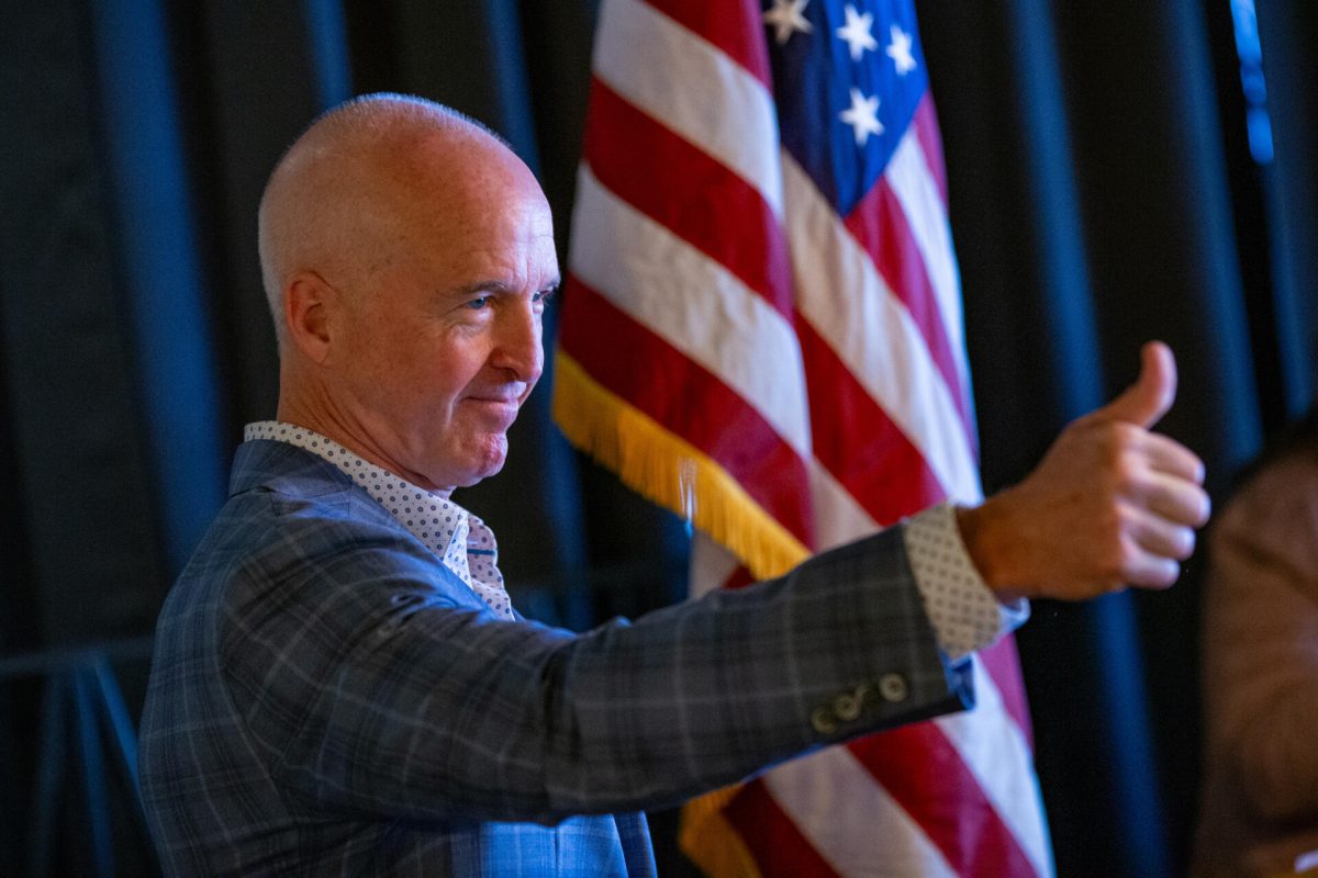 Republican candidate for governor Mike Minogue gives a thumbs up during his introduction at the Cape Cod Republican Women's Luncheon at the Yarmouth House Restaurant. (Jesse Costa/WBUR)